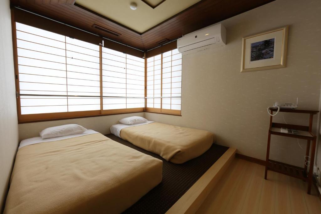Tazuru Hotell Kyoto Rom bilde